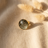 bague cabochon dorée fait main papier lokta noir spirales dorées verre bombé 25mm