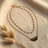 collier double rang fait main papier lokta noir spirales dorées pendentif demi-lune perles noires