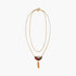 Collier double rang artisanal pendentif demi-lune papier indien motifs Wax
orange et or, perle coraline, fait main France

