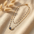 "collier double rang fait main perles bleues pendentif ginkgo doré papier indien"
